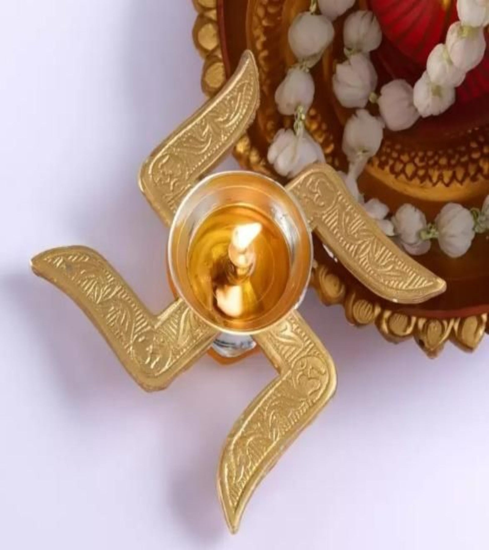 Swastik Brass Diya with Intricate Carving – Auspicious Pooja Décor